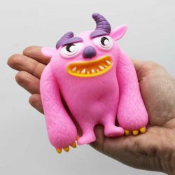 Roligt monster med ljus klämmonster mjuk